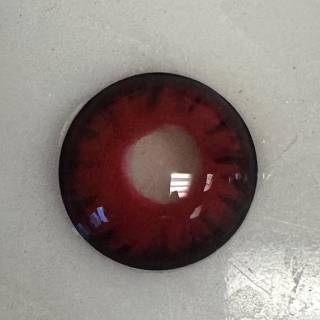 A red eye with black rim and white center.