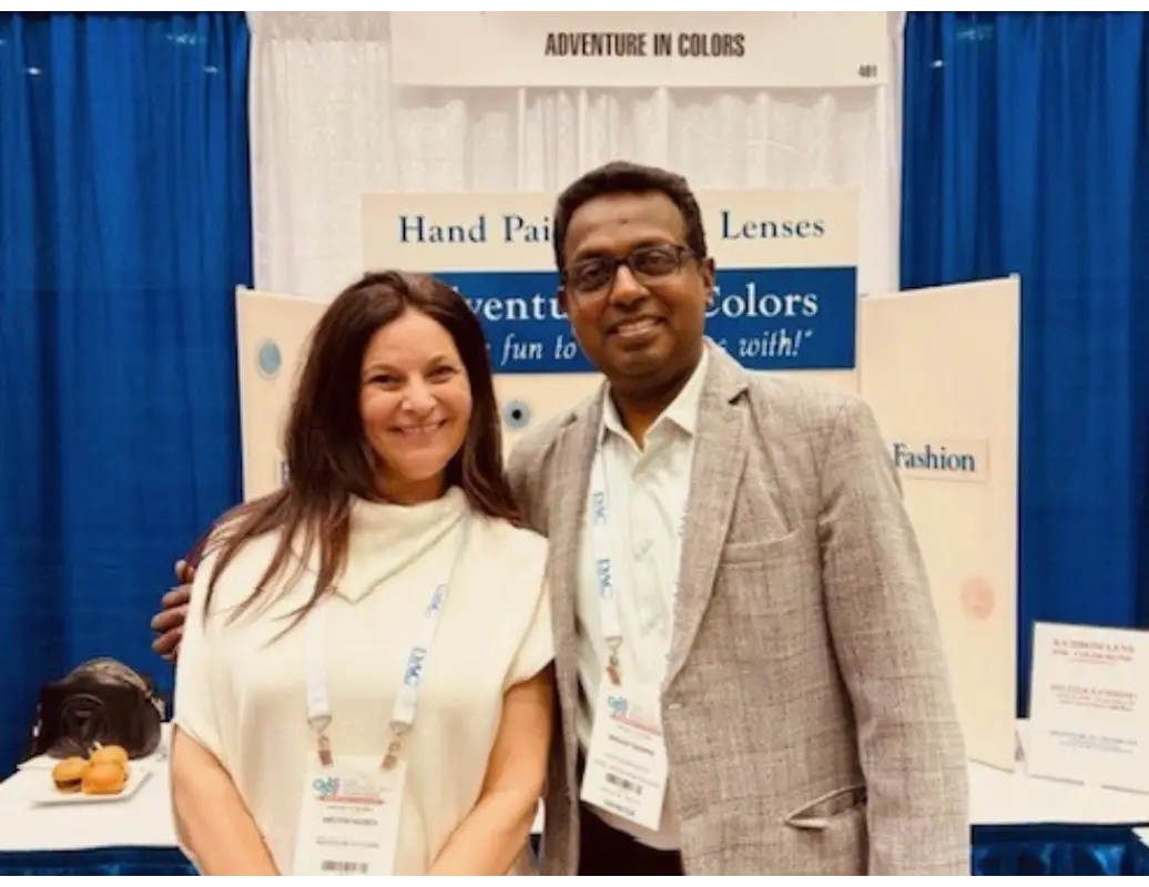 A man and woman posing for the camera.