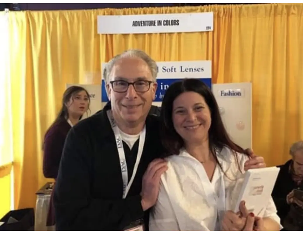 A man and woman posing for the camera.