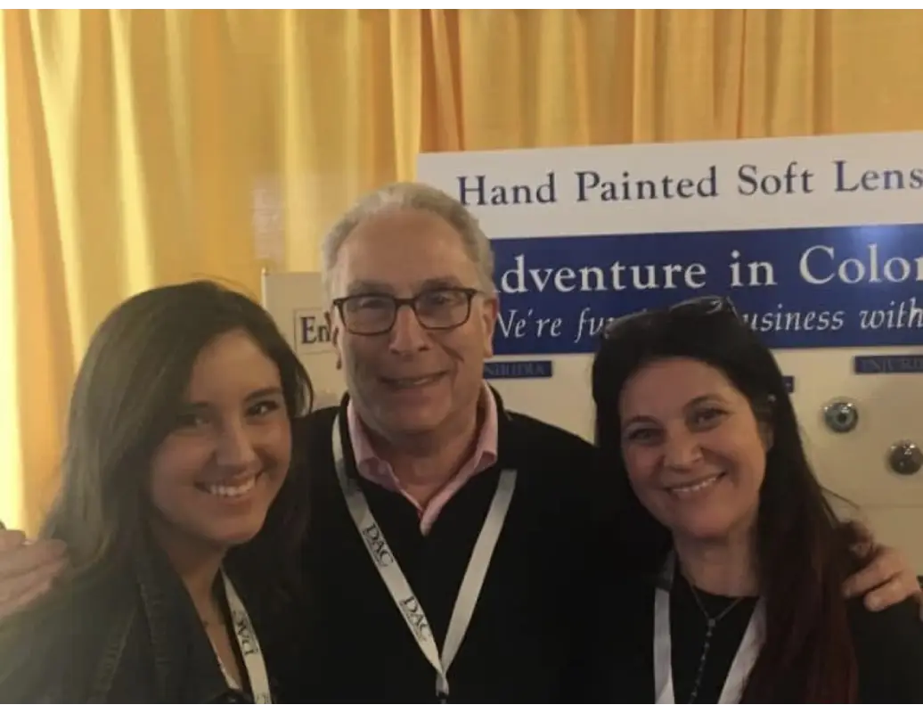 A group of people standing next to each other.